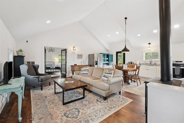 992 Deer Haven Dr, Deer Lodge, MT 59722 - living room with high vaulted ceiling, wood finished floors, and recessed lighting