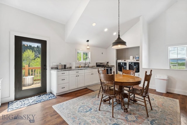 992 Deer Haven Dr, Deer Lodge, MT 59722 - dining space with high vaulted ceiling, wood finished floors, recessed lighting, and baseboards