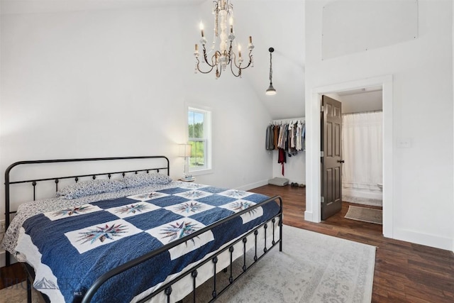 992 Deer Haven Dr, Deer Lodge, MT 59722 - bedroom with a chandelier, wood finished floors, baseboards, and high vaulted ceiling