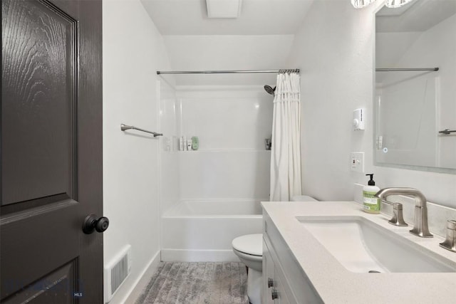 992 Deer Haven Dr, Deer Lodge, MT 59722 - full bathroom featuring toilet, vanity, shower / bath combination with curtain, and baseboards