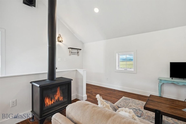 992 Deer Haven Dr, Deer Lodge, MT 59722 - living area featuring lofted ceiling, a wood stove, baseboards, dark wood-style floors, and recessed lighting