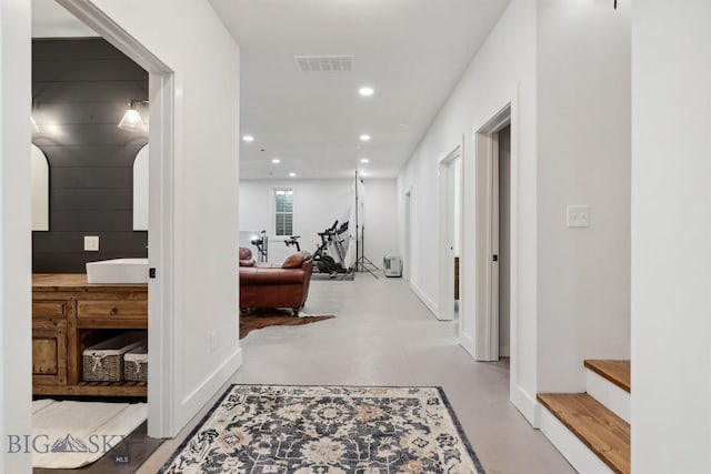 992 Deer Haven Dr, Deer Lodge, MT 59722 - hall with finished concrete floors, recessed lighting, and baseboards