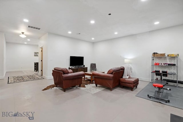992 Deer Haven Dr, Deer Lodge, MT 59722 - living room featuring recessed lighting, baseboards, and concrete flooring
