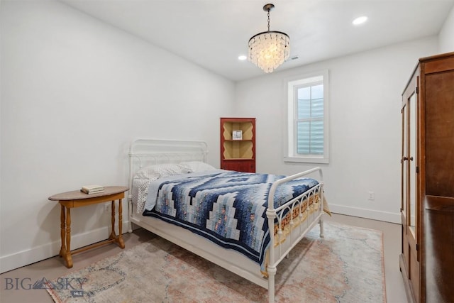 992 Deer Haven Dr, Deer Lodge, MT 59722 - bedroom featuring baseboards, recessed lighting, and a chandelier