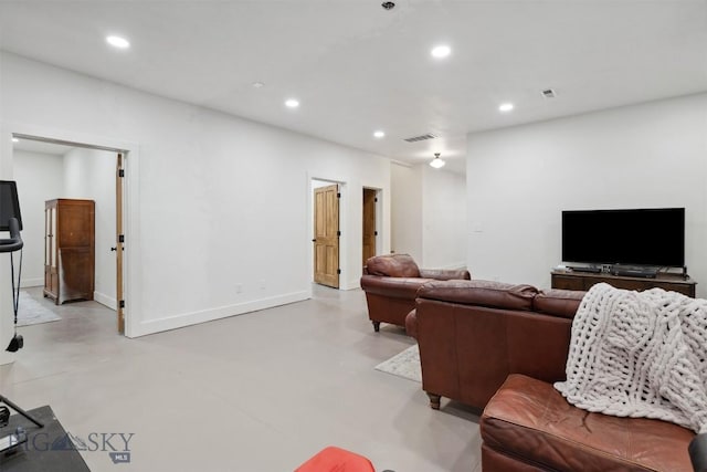 992 Deer Haven Dr, Deer Lodge, MT 59722 - living area with concrete flooring, recessed lighting, and baseboards