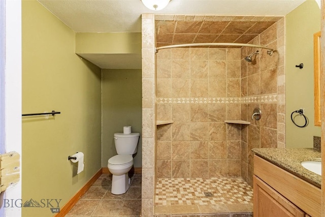 1916 S Jackson, Butte, MT 59701 - full bathroom featuring tile patterned flooring, toilet, tiled shower, and vanity
