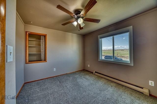 5585 W Cameron Bridge Rd, Manhattan, MT 59741 - carpeted spare room with baseboard heating, ceiling fan, crown molding, and a textured ceiling