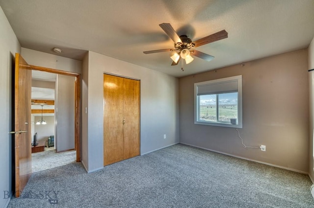 5585 W Cameron Bridge Rd, Manhattan, MT 59741 - unfurnished bedroom with carpet floors, a closet, and ceiling fan