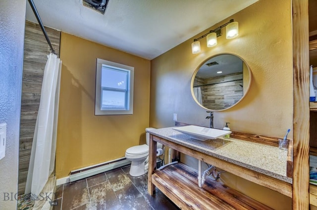 5585 W Cameron Bridge Rd, Manhattan, MT 59741 - bathroom featuring a baseboard radiator and a shower with curtain