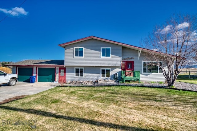 5585 W Cameron Bridge Rd, Manhattan, MT 59741 - split level home featuring an attached garage, driveway, and a front yard
