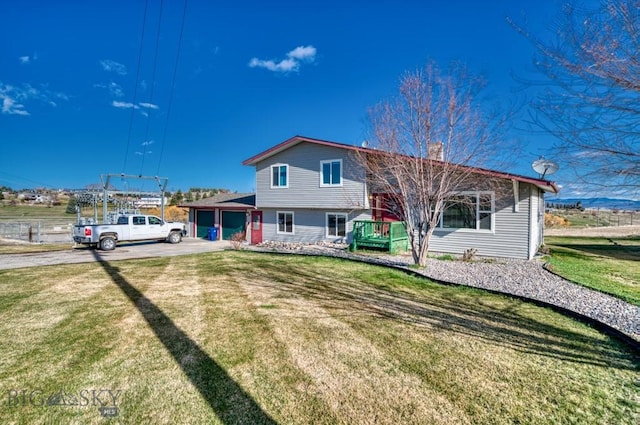 5585 W Cameron Bridge Rd, Manhattan, MT 59741 - view of front facade with a chimney and a front yard