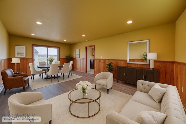 5585 W Cameron Bridge Rd, Manhattan, MT 59741 - living area with a wainscoted wall, wood walls, wood finished floors, and recessed lighting