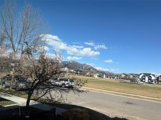 property view of mountains featuring a residential view