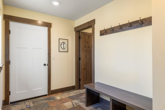 9 Cedar Ct, Ennis, MT 59751 - mudroom with stone finish floors and recessed lighting