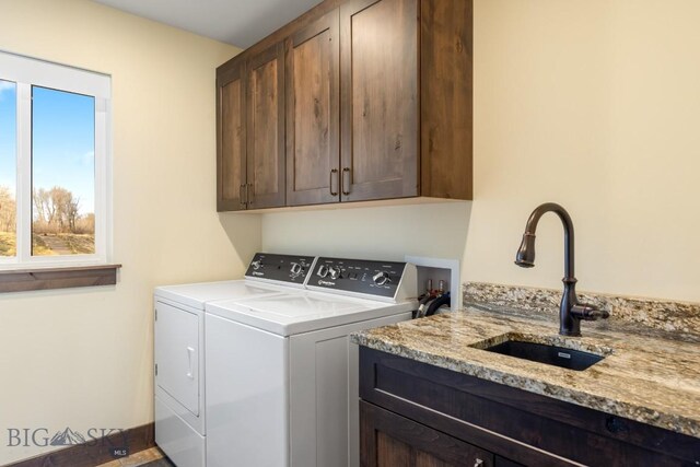 9 Cedar Ct, Ennis, MT 59751 - laundry area with independent washer and dryer and cabinet space