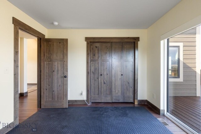 9 Cedar Ct, Ennis, MT 59751 - unfurnished bedroom with wood finished floors and a closet