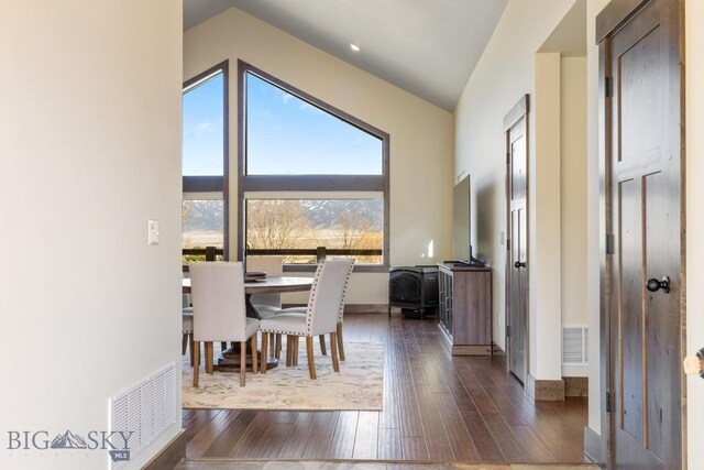 9 Cedar Ct, Ennis, MT 59751 - dining space with hardwood / wood-style floors and high vaulted ceiling