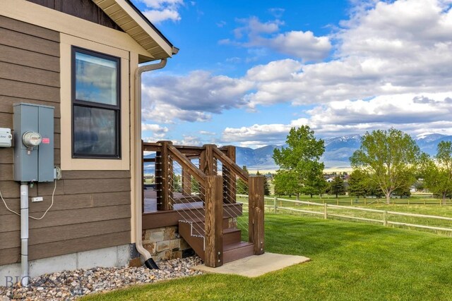 9 Cedar Ct, Ennis, MT 59751 - view of yard with stairs, a rural view, and a mountain view