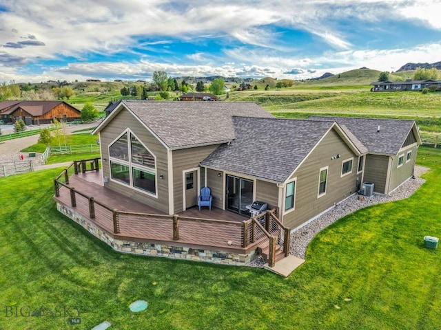 9 Cedar Ct, Ennis, MT 59751 - back of house featuring a shingled roof and a deck with mountain view