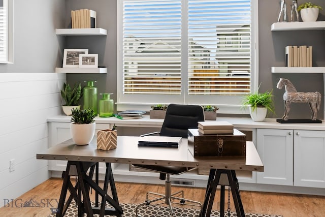 home office featuring light wood finished floors