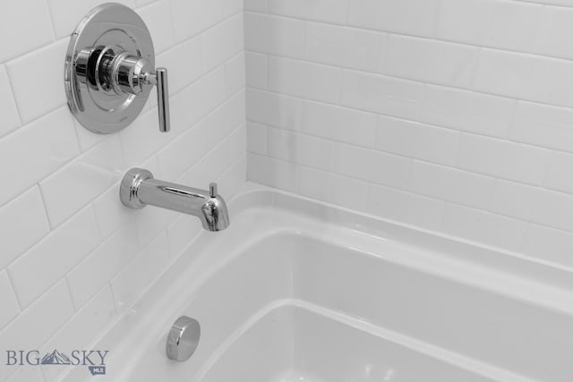 interior details with walk in shower and a tub to relax in