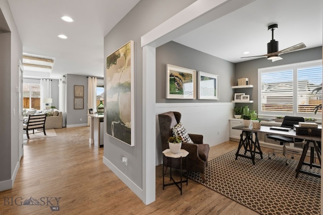 home office featuring a wealth of natural light, wood finished floors, ceiling fan, and recessed lighting