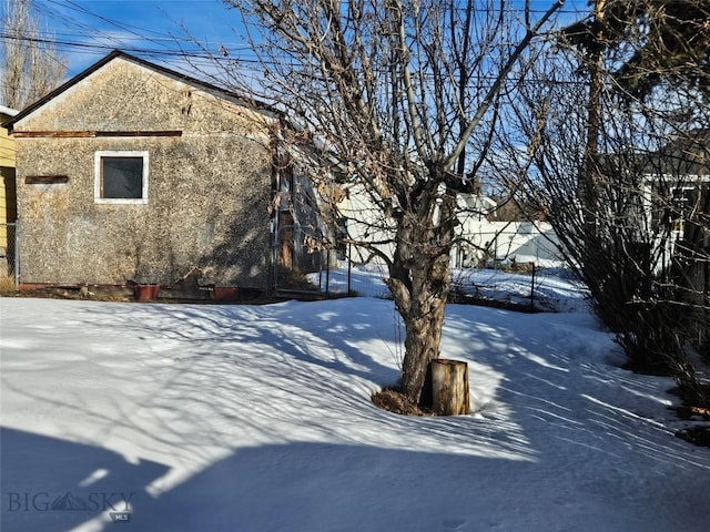 exterior space with stucco siding