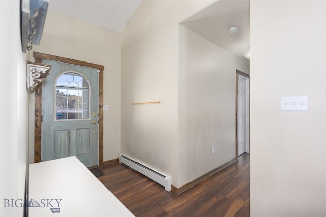 foyer with dark wood-style flooring, baseboards, and a baseboard heating unit