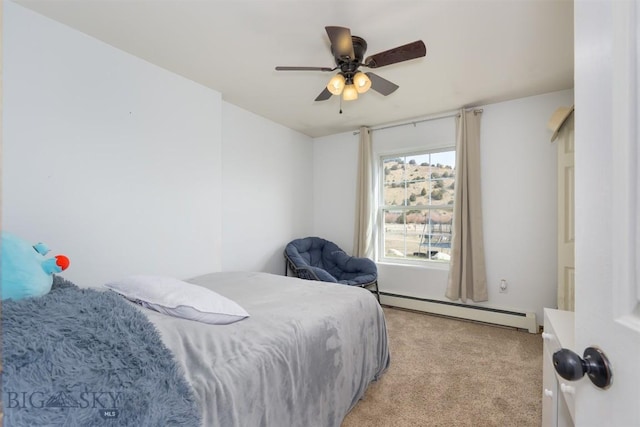 bedroom featuring a baseboard radiator, a ceiling fan, and light carpet