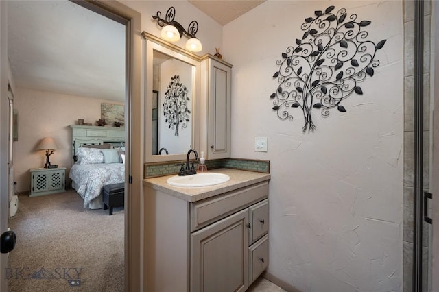 ensuite bathroom featuring vanity and ensuite bathroom