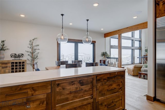 280 High Ridge Rd, Bozeman, MT 59715 - kitchen featuring a wealth of natural light, recessed lighting, built in fridge, and light wood finished floors