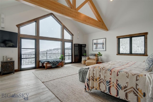 280 High Ridge Rd, Bozeman, MT 59715 - bedroom with access to outside, high vaulted ceiling, multiple windows, and beam ceiling