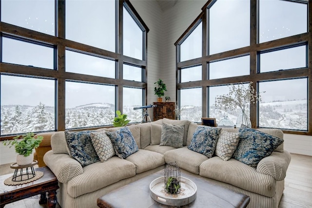 280 High Ridge Rd, Bozeman, MT 59715 - living room featuring a towering ceiling, a mountain view, and wood finished floors