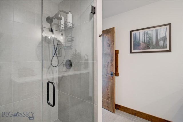 280 High Ridge Rd, Bozeman, MT 59715 - full bath featuring tile patterned floors, baseboards, and a stall shower