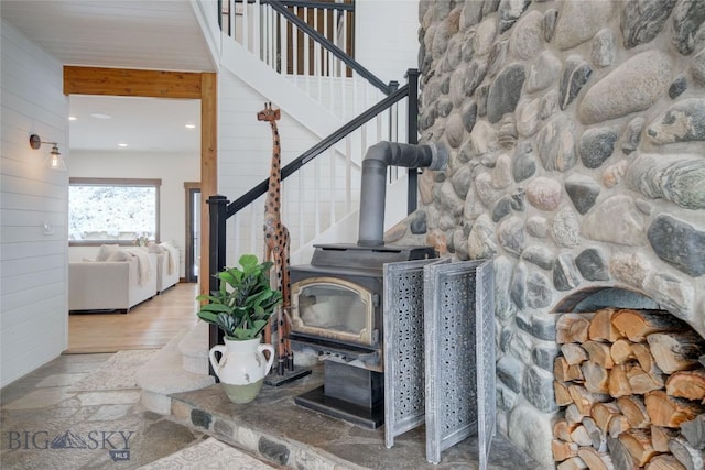 280 High Ridge Rd, Bozeman, MT 59715 - interior details featuring wooden walls, a wood stove, and wood finished floors