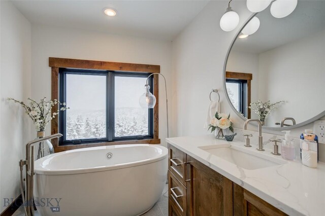 280 High Ridge Rd, Bozeman, MT 59715 - full bathroom with recessed lighting, vanity, and a soaking tub