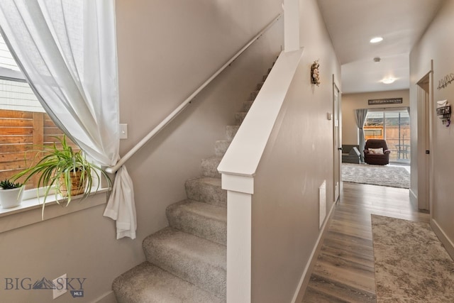 1519 Butler Crk Unit B, Belgrade, MT 59714 - stairs with wood finished floors, baseboards, and recessed lighting