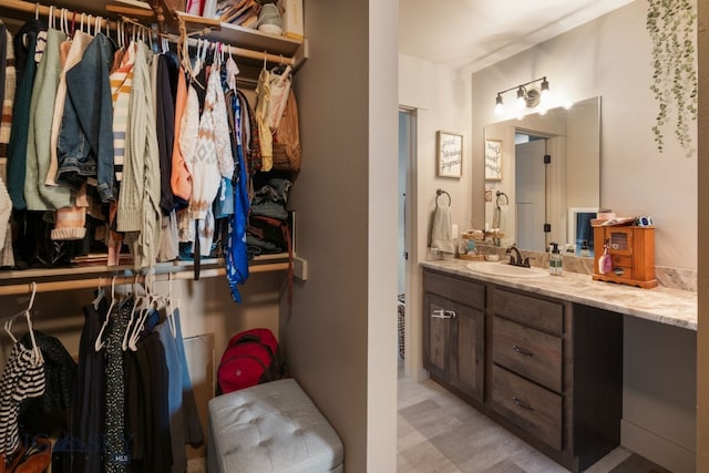 1519 Butler Crk Unit B, Belgrade, MT 59714 - bathroom with a walk in closet and vanity