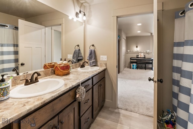 1519 Butler Crk Unit B, Belgrade, MT 59714 - full bath with double vanity and a shower with shower curtain