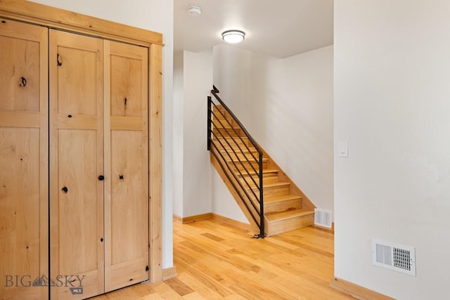 614 S 6th, Bozeman, MT 59715 - stairs featuring visible vents, baseboards, and wood finished floors