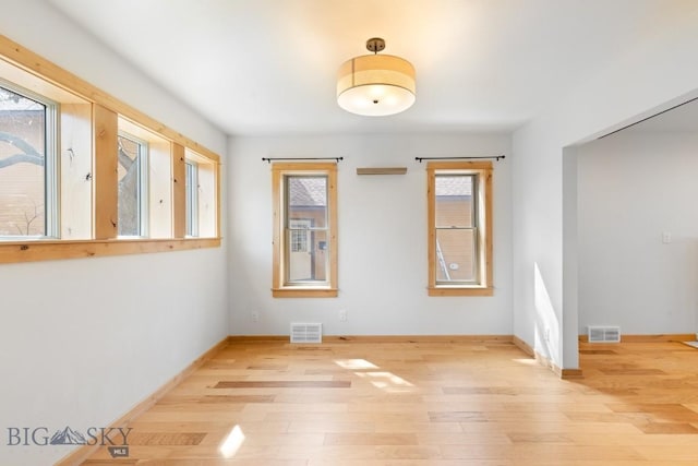 614 S 6th, Bozeman, MT 59715 - unfurnished room featuring wood finished floors, baseboards, and visible vents