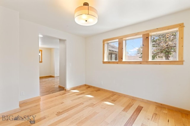 614 S 6th, Bozeman, MT 59715 - empty room with light wood-style flooring and baseboards