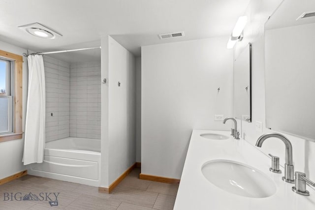 614 S 6th, Bozeman, MT 59715 - bathroom with baseboards, a sink, and visible vents