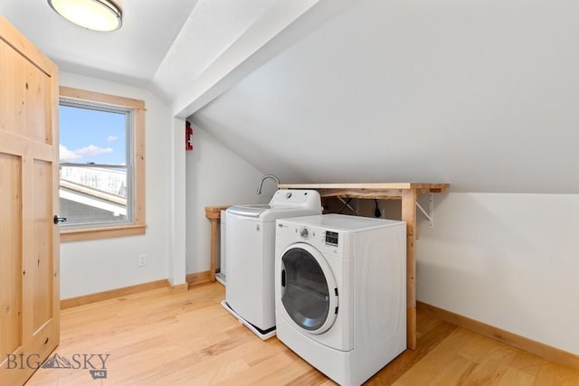 614 S 6th, Bozeman, MT 59715 - laundry area with baseboards, light wood-style flooring, laundry area, and washing machine and clothes dryer