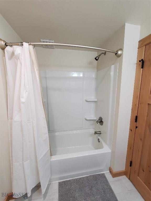 614 S 6th, Bozeman, MT 59715 - bathroom featuring tile patterned floors and shower / tub combo with curtain