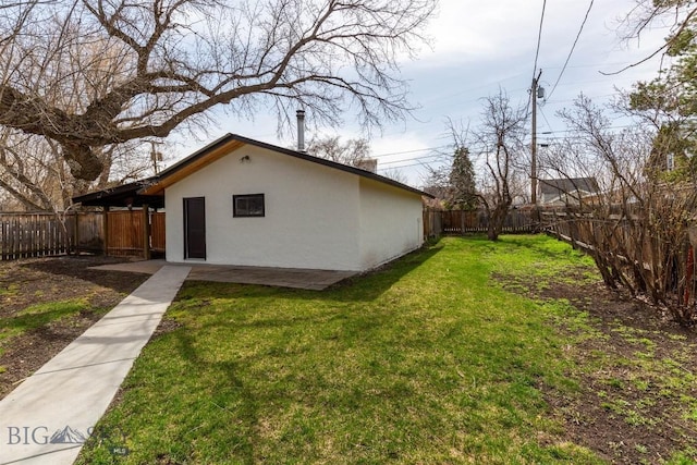 view of outbuilding featuring a fenced backyard