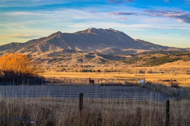 mountain view featuring a rural view