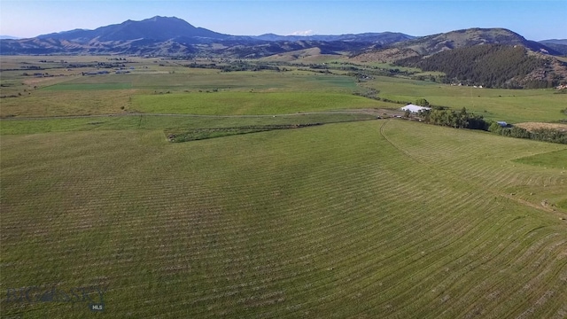 bird's eye view with a mountain view and a rural view