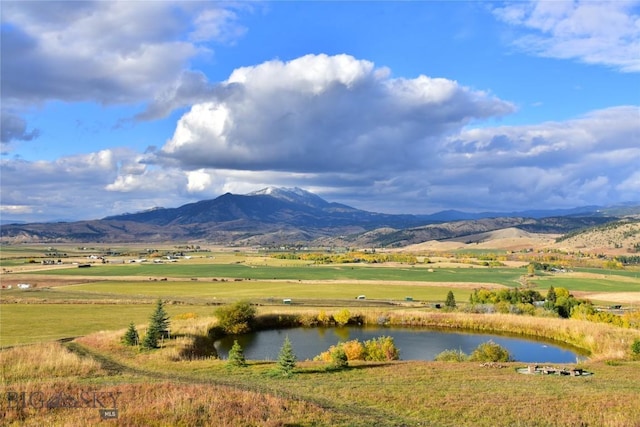 property view of mountains featuring a water view