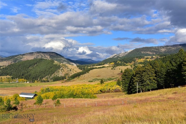 view of mountain feature featuring a rural view